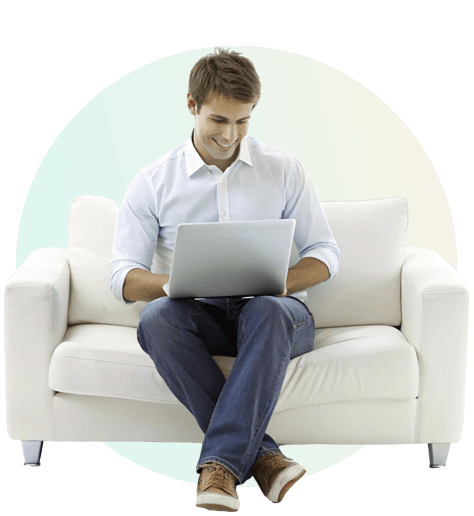 A real estate agent looking at an animated advertisement on laptop